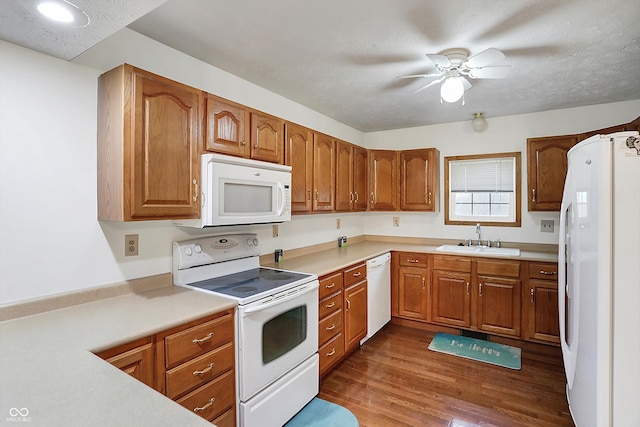 5371 Lue Ann Ln, Mooresville, IN 46158 - kitchen with dark wood-style floors, a sink, brown cabinetry, and white appliances