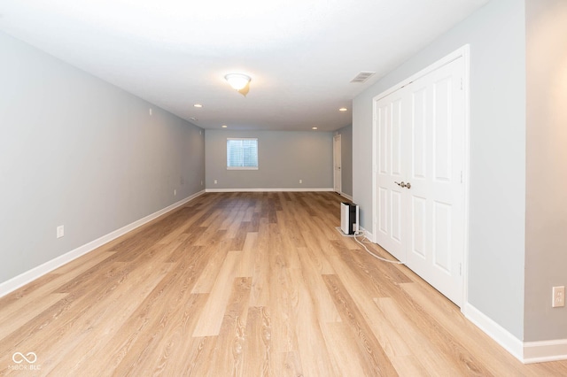 2314 Angelina Way, Greenwood, IN 46143 - spare room featuring light wood-type flooring, baseboards, and visible vents