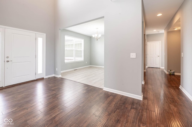 2314 Angelina Way, Greenwood, IN 46143 - entryway featuring an inviting chandelier, hardwood / wood-style flooring, baseboards, and recessed lighting