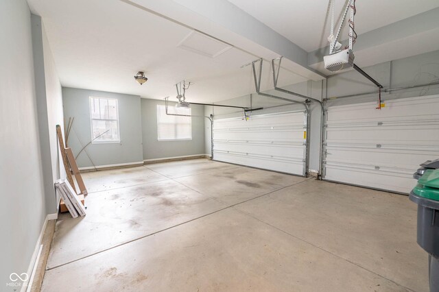 2314 Angelina Way, Greenwood, IN 46143 - garage with a garage door opener and baseboards