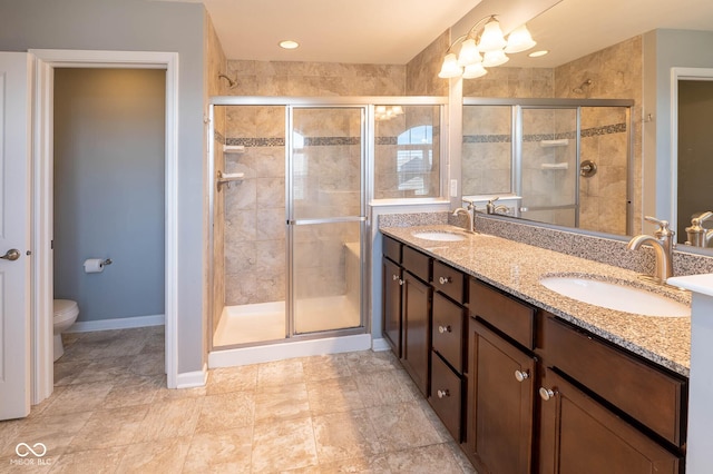 2314 Angelina Way, Greenwood, IN 46143 - bathroom with double vanity, a sink, toilet, and a shower stall