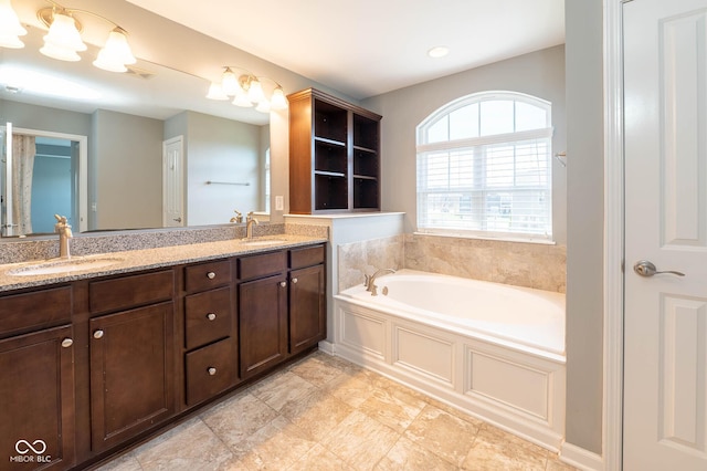 2314 Angelina Way, Greenwood, IN 46143 - full bathroom featuring double vanity, a sink, and a bath