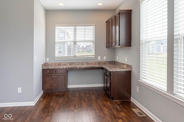 2314 Angelina Way, Greenwood, IN 46143 - unfurnished office featuring dark wood-type flooring, built in study area, visible vents, and baseboards