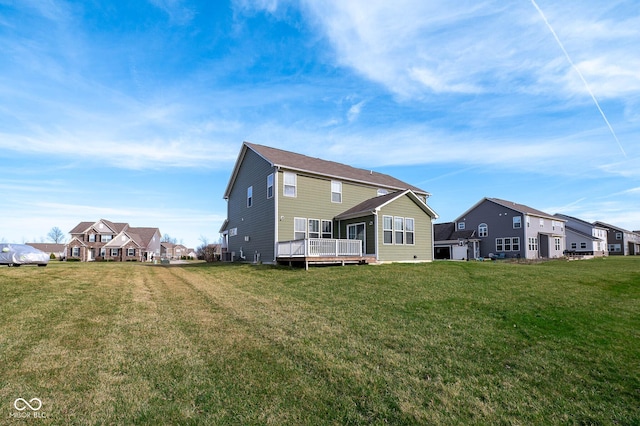 2314 Angelina Way, Greenwood, IN 46143 - rear view of house featuring a residential view, a deck, and a yard