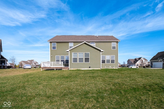 2314 Angelina Way, Greenwood, IN 46143 - rear view of house with a yard and a wooden deck