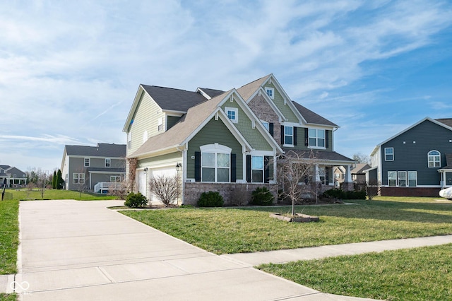2314 Angelina Way, Greenwood, IN 46143 - craftsman house with driveway, brick siding, a front yard, and a residential view