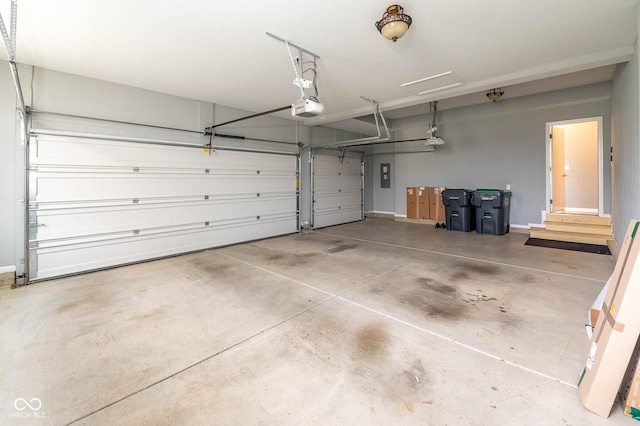 2314 Angelina Way, Greenwood, IN 46143 - garage featuring electric panel and a garage door opener