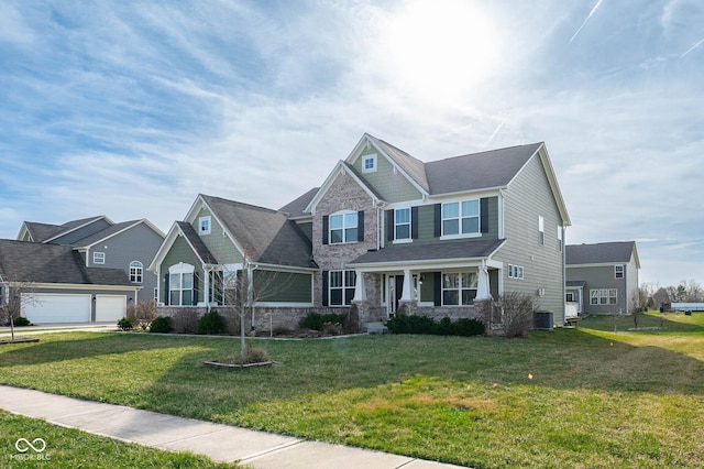 2314 Angelina Way, Greenwood, IN 46143 - craftsman inspired home with stone siding, central AC, and a front yard