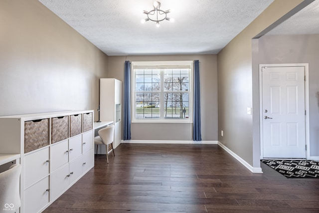 12959 Balfour Rd, Fishers, IN 46037 - entrance foyer featuring dark wood-style flooring, a textured ceiling, and baseboards