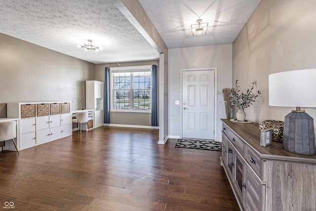 12959 Balfour Rd, Fishers, IN 46037 - entryway with dark wood finished floors and baseboards