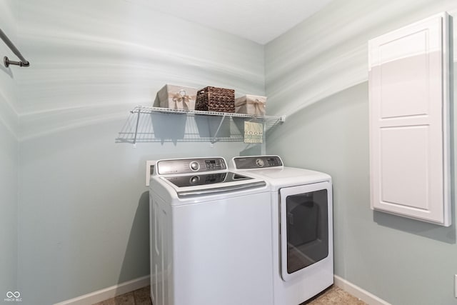 12959 Balfour Rd, Fishers, IN 46037 - laundry room with washer and dryer and baseboards