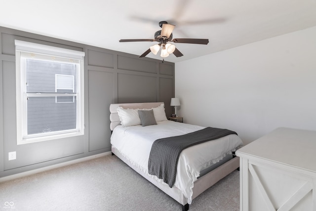 12959 Balfour Rd, Fishers, IN 46037 - carpeted bedroom featuring a decorative wall and a ceiling fan