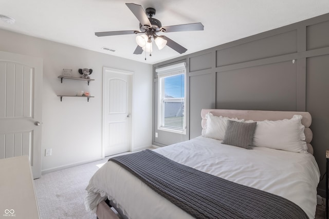 12959 Balfour Rd, Fishers, IN 46037 - bedroom with light carpet, baseboards, and a ceiling fan