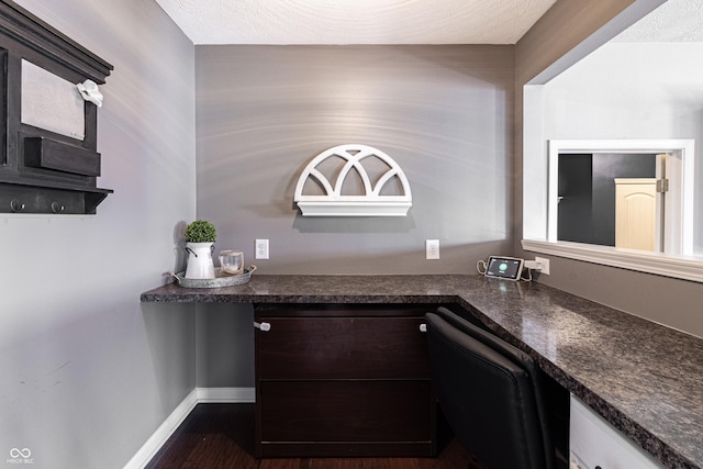12959 Balfour Rd, Fishers, IN 46037 - bar featuring built in study area, dark wood-type flooring, dishwasher, and a textured ceiling