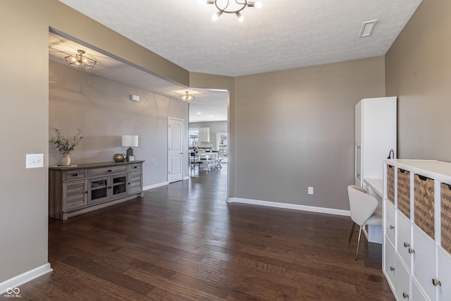 12959 Balfour Rd, Fishers, IN 46037 - interior space with a textured ceiling, baseboards, and dark wood-style flooring