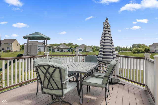 12959 Balfour Rd, Fishers, IN 46037 - deck with outdoor dining area, a residential view, a water view, and a lawn