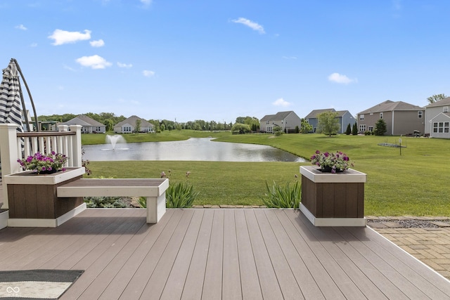 12959 Balfour Rd, Fishers, IN 46037 - wooden terrace featuring a water view, a lawn, and a residential view