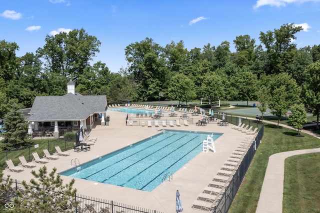 12959 Balfour Rd, Fishers, IN 46037 - community pool with a patio and view of wooded area
