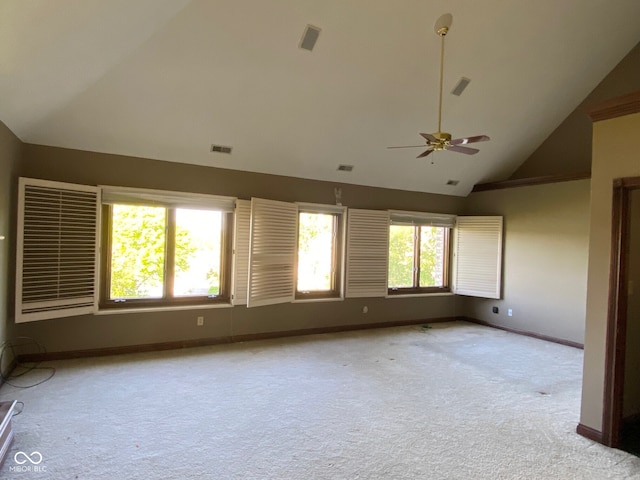 11967 Windpointe Pass, Carmel, IN 46033 - spare room with carpet floors, ceiling fan, baseboards, and high vaulted ceiling