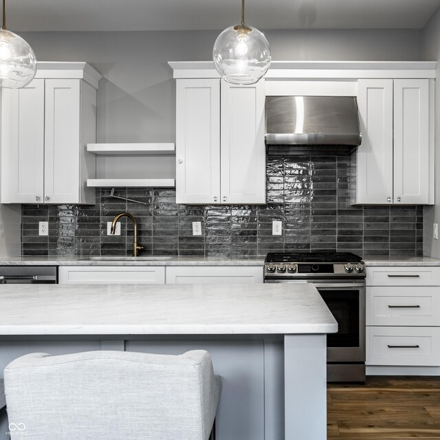 1665 N College Ave, Indianapolis, IN 46202 - kitchen with stainless steel range with gas stovetop, exhaust hood, a sink, open shelves, and light countertops