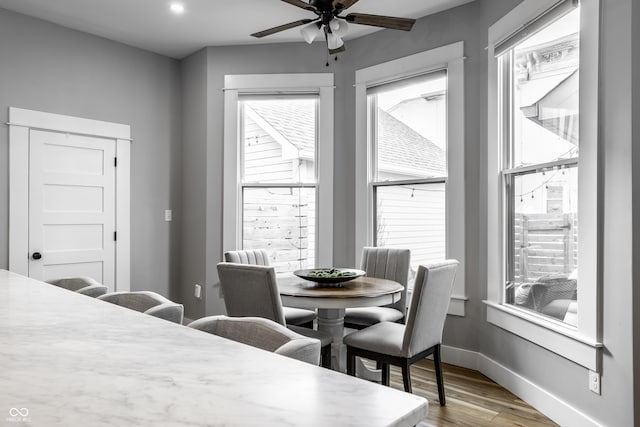 1665 N College Ave, Indianapolis, IN 46202 - dining area featuring wood finished floors, ceiling fan, baseboards, and recessed lighting
