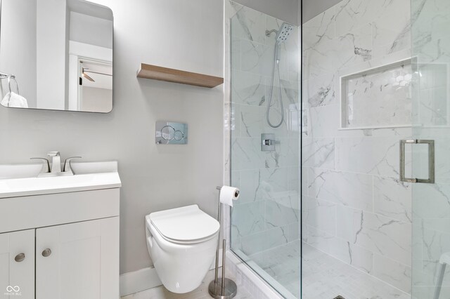 1665 N College Ave, Indianapolis, IN 46202 - bathroom with a shower stall, vanity, and toilet