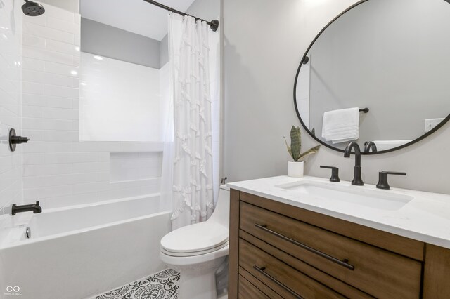 1665 N College Ave, Indianapolis, IN 46202 - bathroom with shower / tub combo with curtain, toilet, vanity, and tile patterned floors