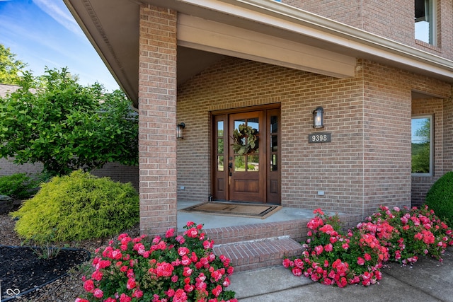 9398 W Mirror Rd, Columbus, IN 47201 - view of exterior entry featuring brick siding