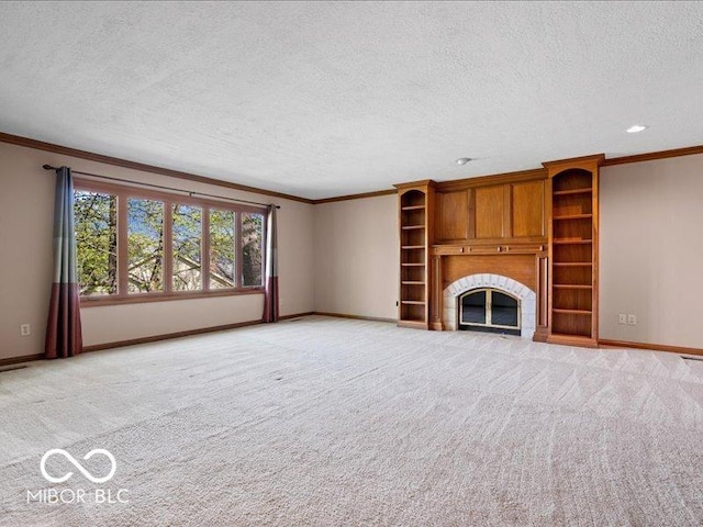 unfurnished living room with baseboards, ornamental molding, and a textured ceiling