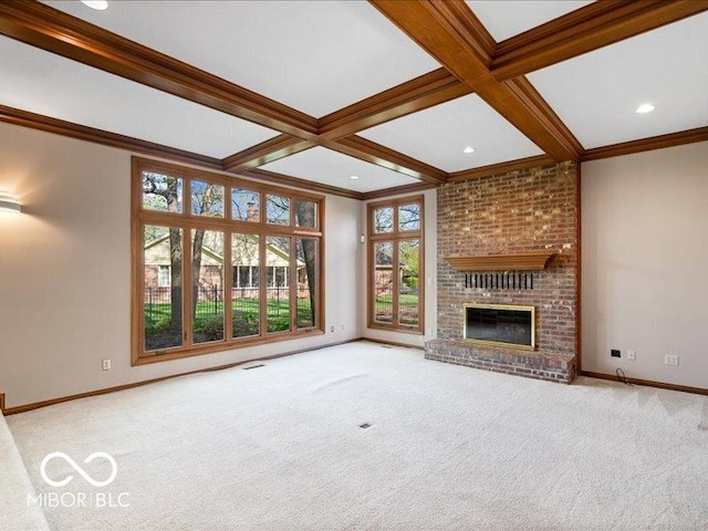 unfurnished living room with baseboards, carpet, beam ceiling, and coffered ceiling