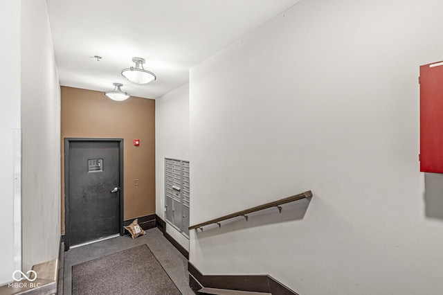 622 E 10th St Unit 206, Indianapolis, IN 46202 - stairway featuring carpet floors and baseboards