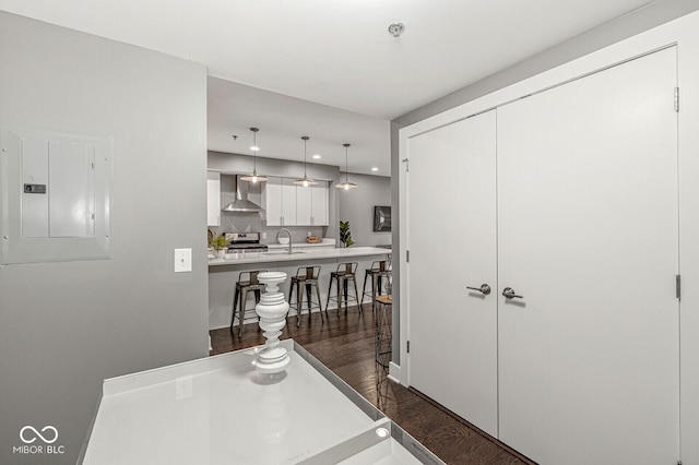 622 E 10th St Unit 206, Indianapolis, IN 46202 - dining space featuring dark wood finished floors, electric panel, and recessed lighting