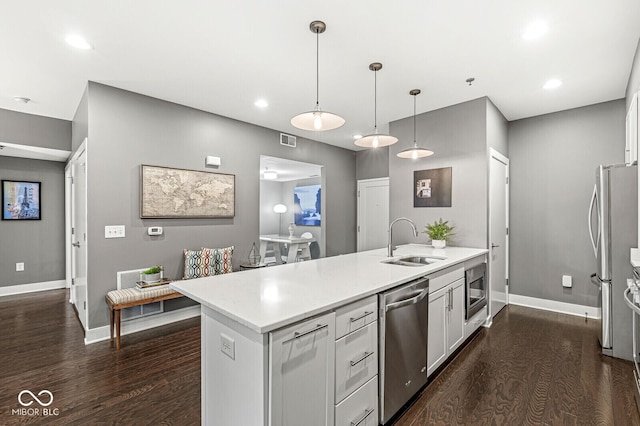 622 E 10th St Unit 206, Indianapolis, IN 46202 - kitchen featuring a sink, stainless steel appliances, dark wood-style floors, baseboards, and recessed lighting