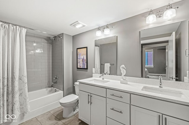 622 E 10th St Unit 206, Indianapolis, IN 46202 - bathroom with tile patterned floors, toilet, shower / bath combination with curtain, and double vanity