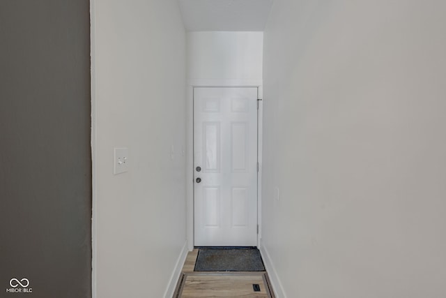 843 N Oxford St, Indianapolis, IN 46201 - doorway with baseboards and light wood-style floors
