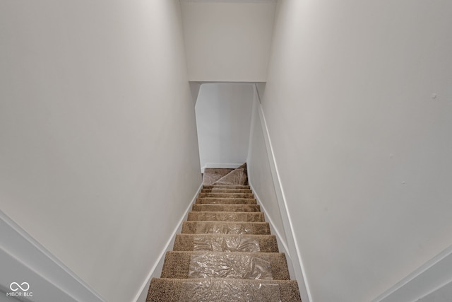 843 N Oxford St, Indianapolis, IN 46201 - staircase featuring baseboards