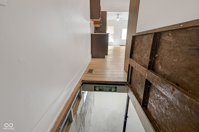 843 N Oxford St, Indianapolis, IN 46201 - staircase with baseboards and wood finished floors