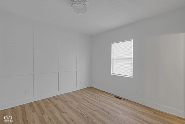 843 N Oxford St, Indianapolis, IN 46201 - empty room with light wood-type flooring and baseboards