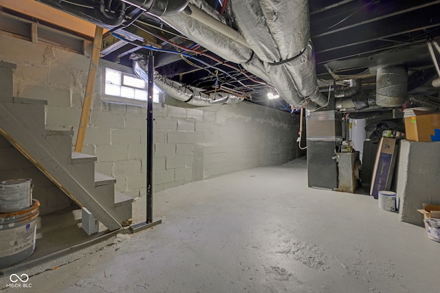 843 N Oxford St, Indianapolis, IN 46201 - below grade area featuring heating unit and stairs