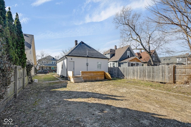 843 N Oxford St, Indianapolis, IN 46201 - rear view of house featuring a residential view and a chimney