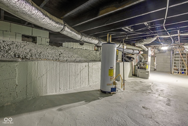 843 N Oxford St, Indianapolis, IN 46201 - unfinished basement featuring gas water heater and heating unit
