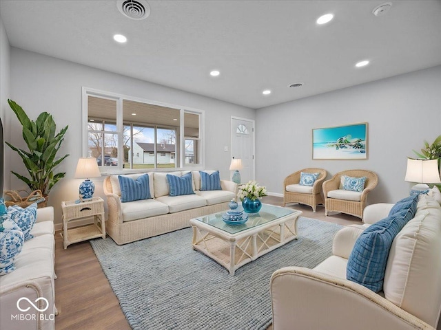 329 Roosevelt Dr, Shelbyville, IN 46176 - living area with recessed lighting, wood finished floors, visible vents, and baseboards