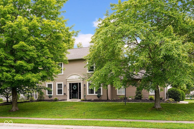 7383 Poppyseed Dr, Indianapolis, IN 46237 - view of front of property featuring a front lawn and roof with shingles
