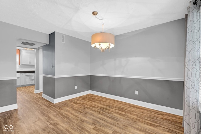 7383 Poppyseed Dr, Indianapolis, IN 46237 - unfurnished dining area featuring wood finished floors and baseboards