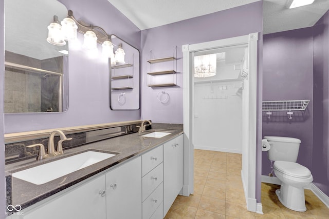 7383 Poppyseed Dr, Indianapolis, IN 46237 - bathroom featuring double vanity, toilet, baseboards, and tile patterned floors