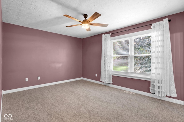 7383 Poppyseed Dr, Indianapolis, IN 46237 - carpeted empty room featuring ceiling fan, baseboards, and a textured ceiling
