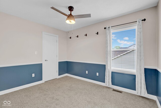 7383 Poppyseed Dr, Indianapolis, IN 46237 - unfurnished room featuring carpet floors, a ceiling fan, and baseboards