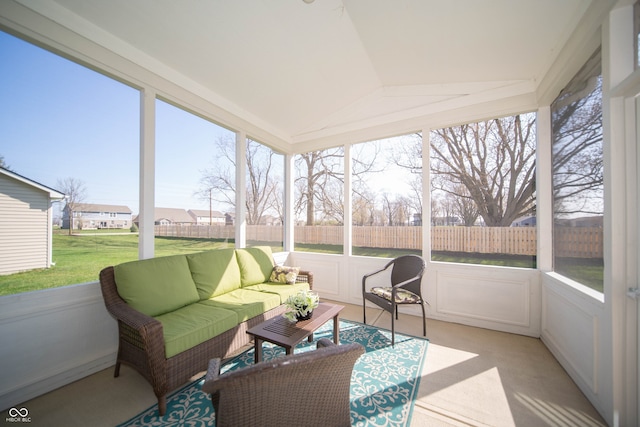 sunroom featuring outdoor lounge area