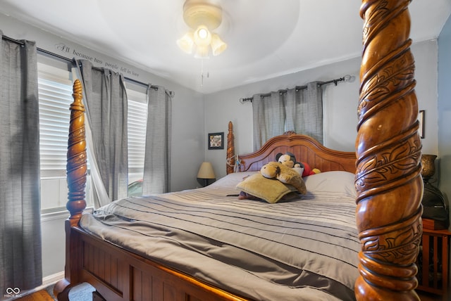 bedroom with ceiling fan and wood finished floors