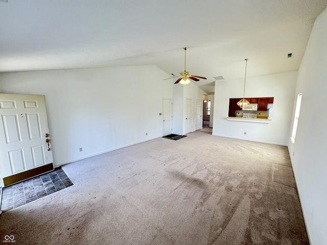 unfurnished living room featuring baseboards, high vaulted ceiling, ceiling fan, and carpet floors